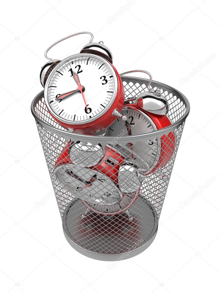 Wasting Time Concept Clocks in Trash Bin. Stock Photo by ©tashatuvango