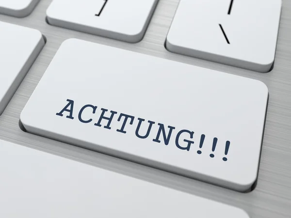 Achtung! -przycisk na klawiaturze. — Zdjęcie stockowe