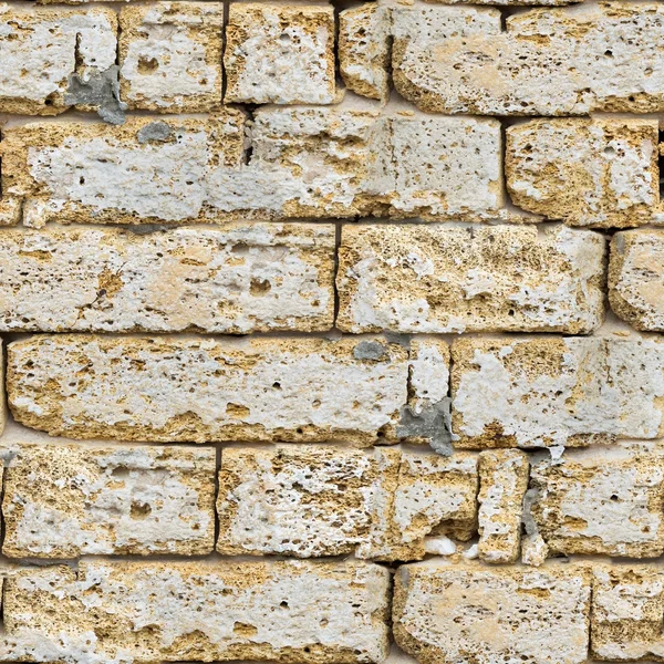 Piedra arenisca ladrillo pared sin costura . — Foto de Stock