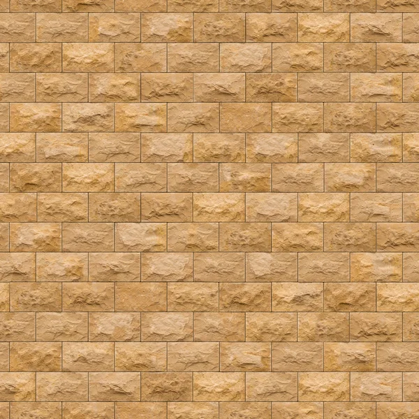 Nahtlose Struktur der gelben Sandsteinmauer. — Stockfoto