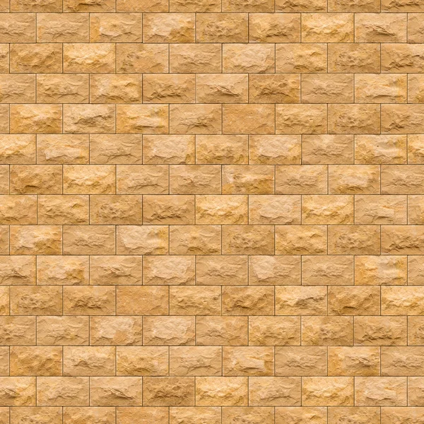 Naadloze textuur van gele bakstenen muur. — Stockfoto