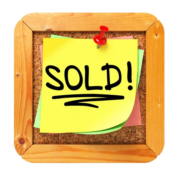 Sold!. Yellow Sticker on Bulletin. — Stock Photo, Image