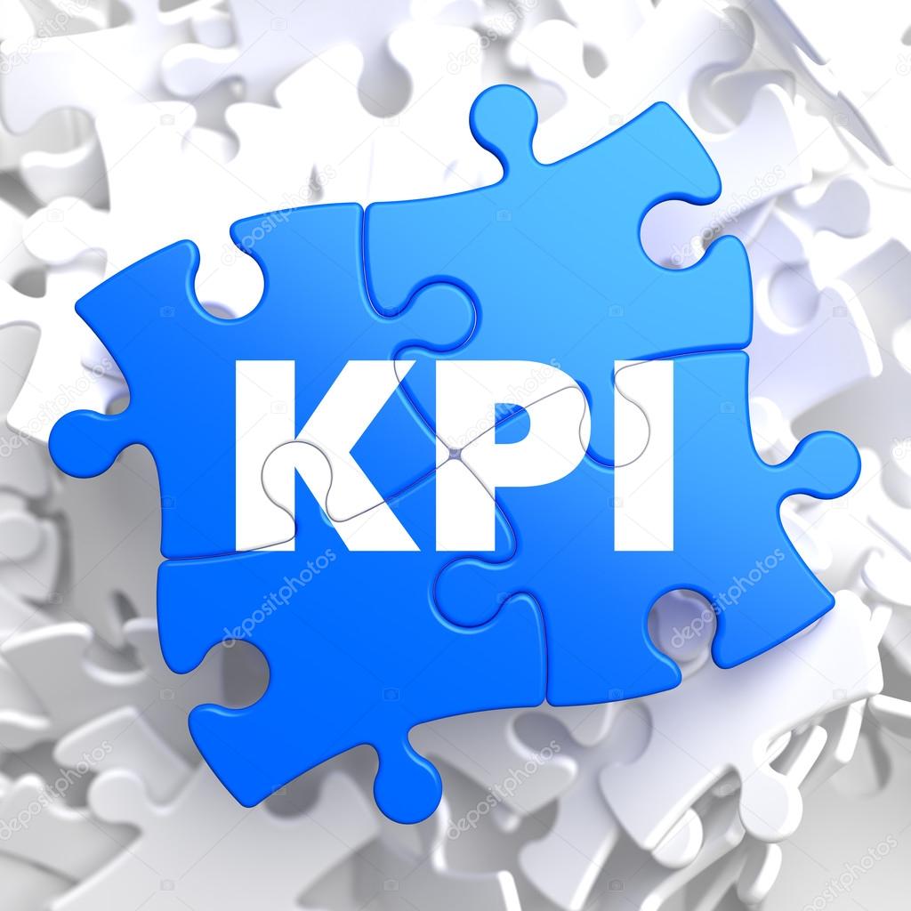 KPI on Blue Puzzle Pieces. Business Concept.