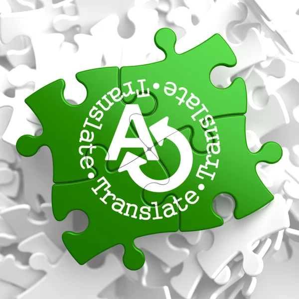 Translating Concept on Green Puzzle Pieces. — Stockfoto