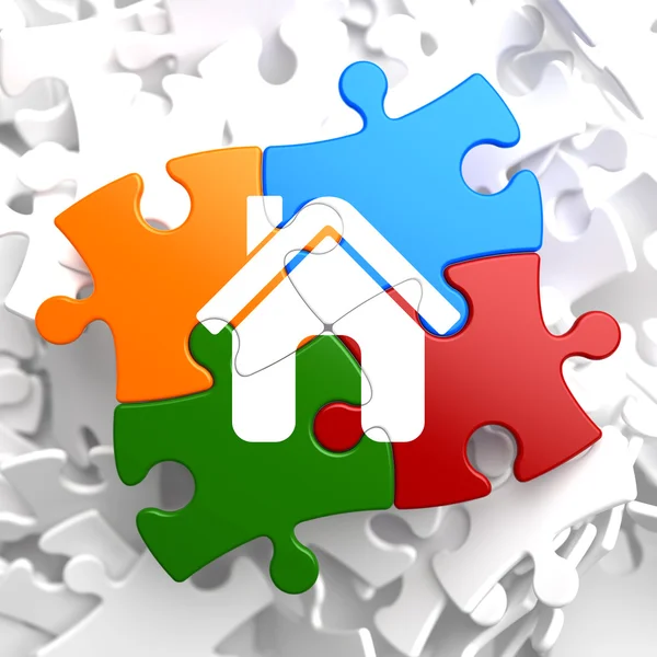 Home-Symbol auf Multicolor Puzzle. — Stockfoto
