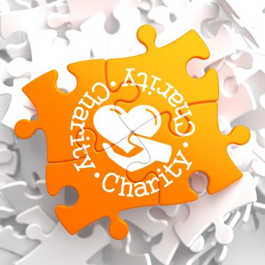 Charity Concept on Orange Puzzle. clipart