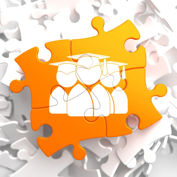 Gruppe von Absolventen Symbol auf orange Puzzle. — Stockfoto