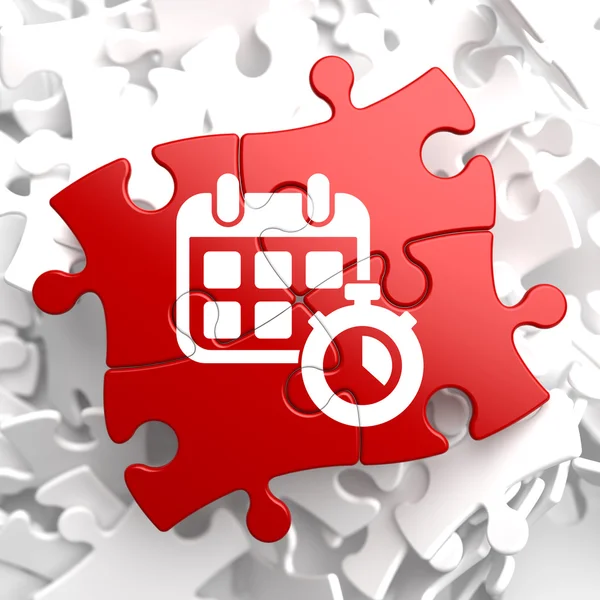 Kalender mit Timer-Symbol auf rotem Puzzle. — Stockfoto