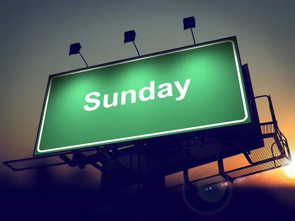 Sunday - Billboard on the Sunrise Background. — Stock Photo, Image