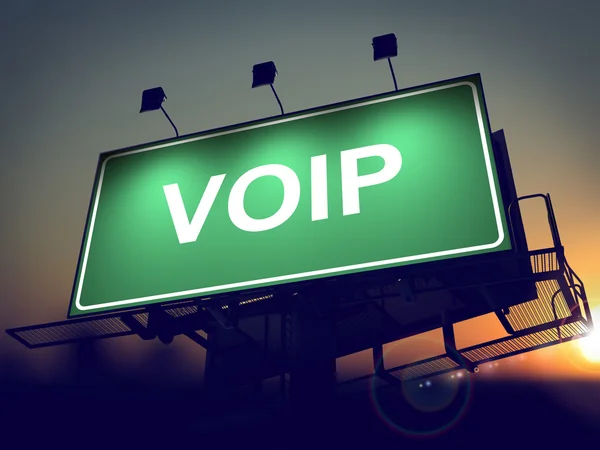 Voip 电话-在日出背景上的广告牌. — 图库照片