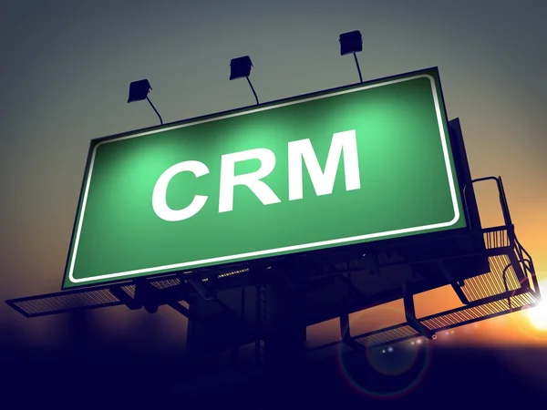 Crm - 日の出背景にビルボード. — ストック写真