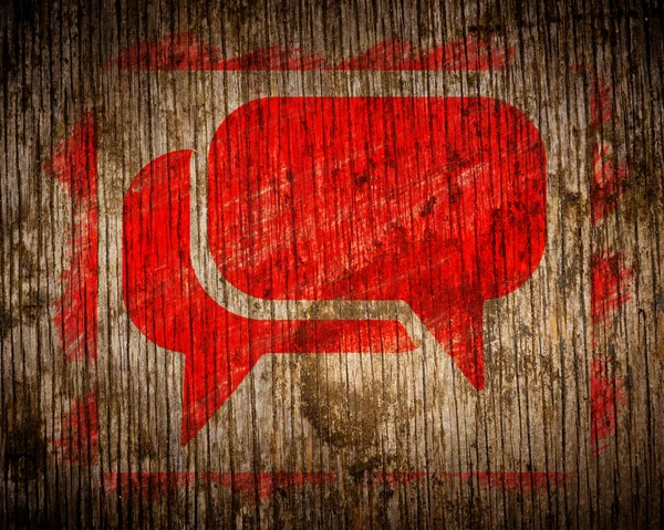 Red Speech Bubble Icon on Wood. — Stock Photo, Image