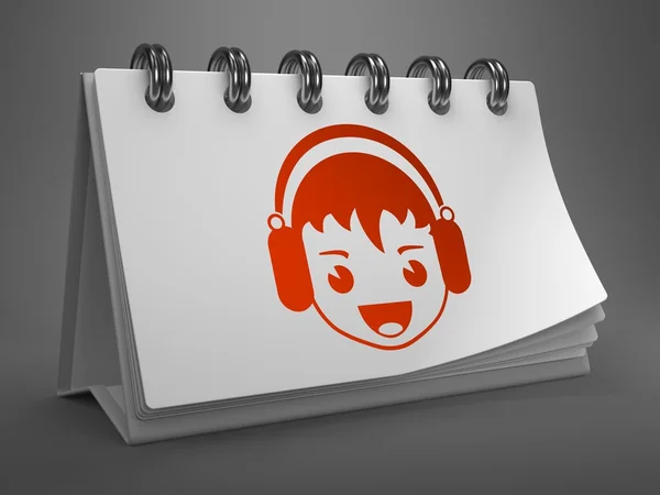 Skrivbordskalender - pojke med hörlurar-ikonen. — Stockfoto