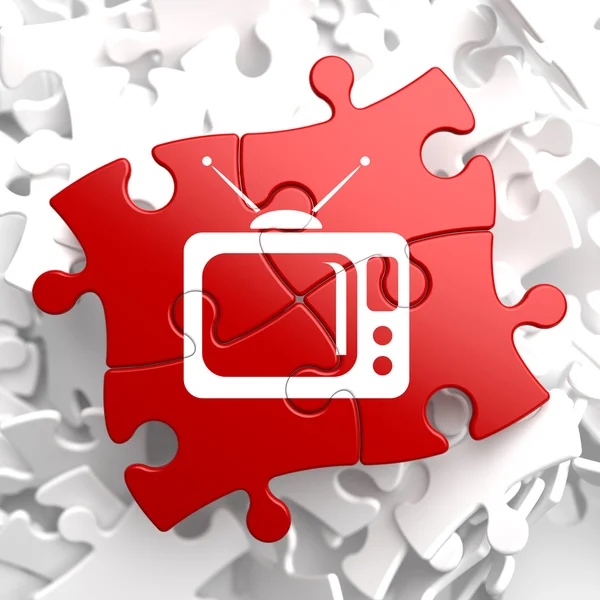 Tv set icon auf red puzzle. — Stockfoto