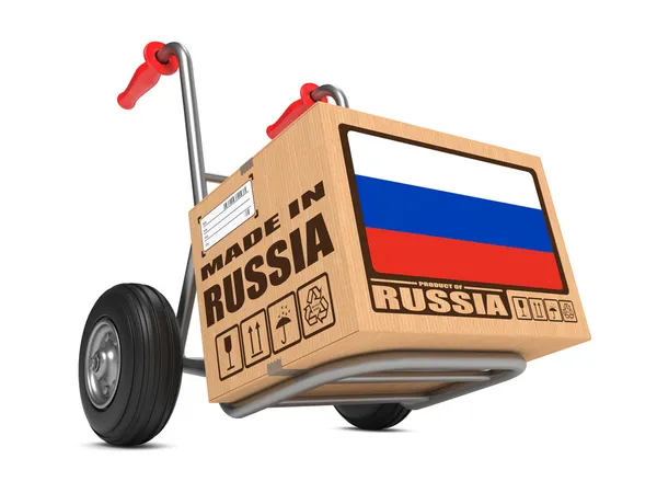 Made in Russia - Cardboard Box on Hand Truck. — Stock Photo, Image