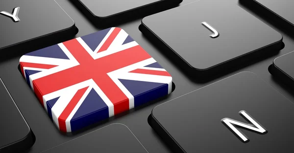 イギリス - 黒いキーボードのボタン上のフラグ. — ストック写真
