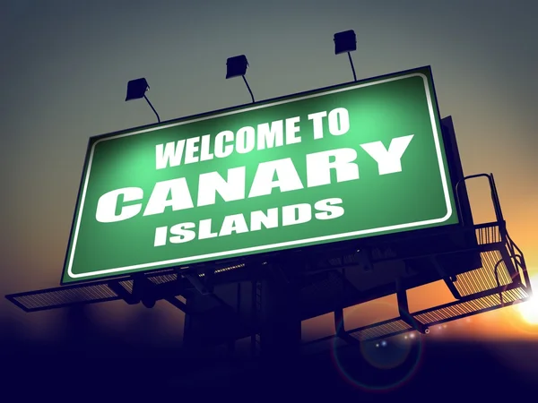 欢迎来到加那利群岛在日出时的广告牌. — 图库照片
