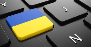 Ukraine - Flag on Button of Black Keyboard. clipart
