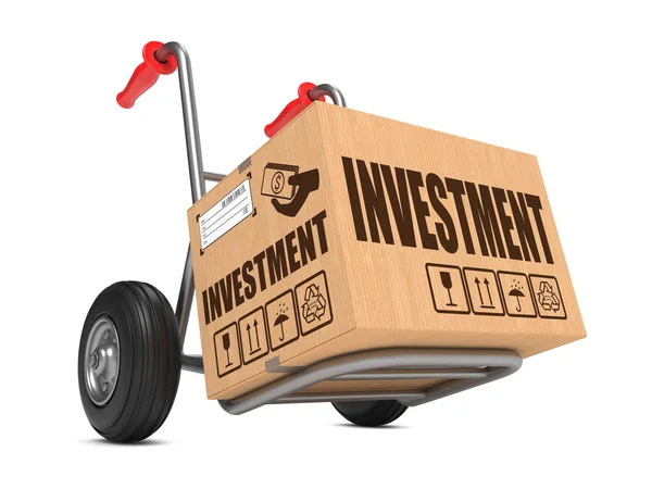 Investment - Cardboard Box on Hand Truck. — Stock Photo, Image