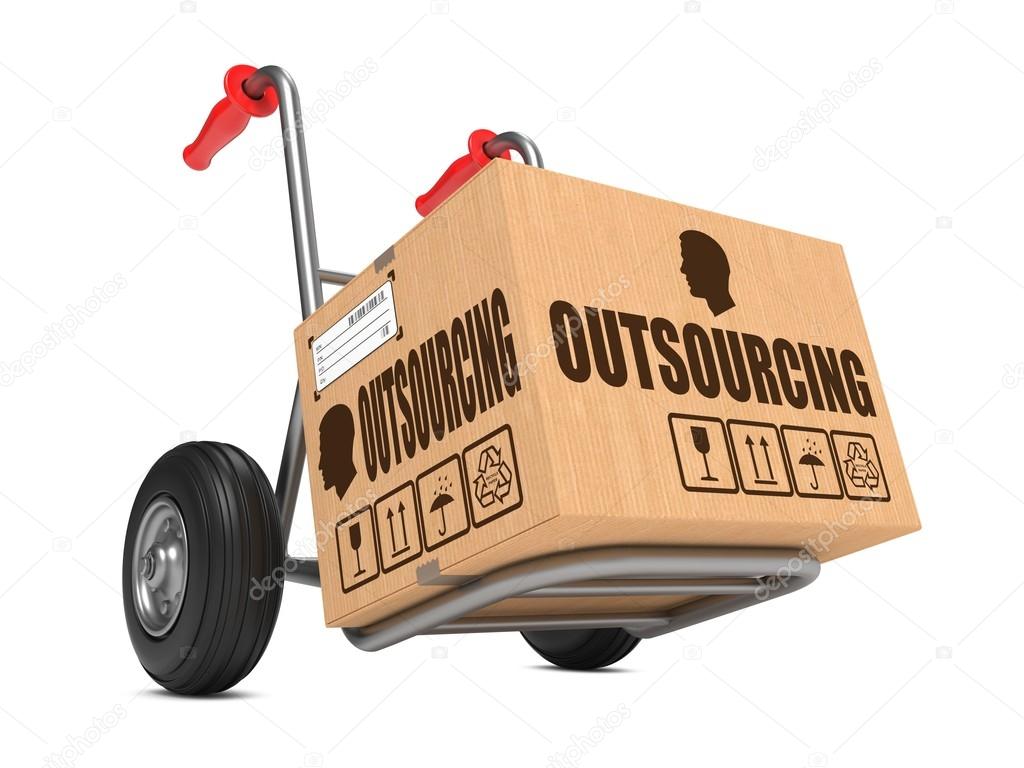 Outsourcing - Cardboard Box on Hand Truck.