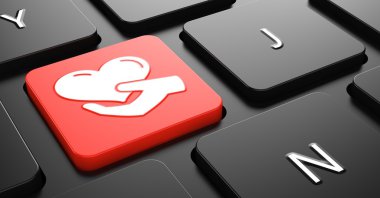 Icon of Heart in the Hand on Red Keyboard Button. clipart
