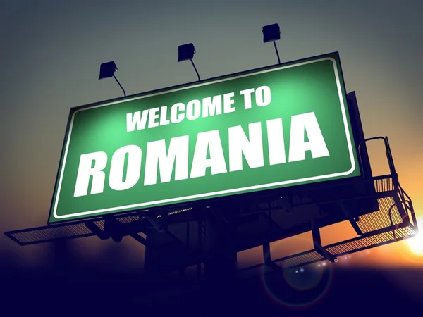 欢迎来到罗马尼亚日出时的广告牌. — 图库照片