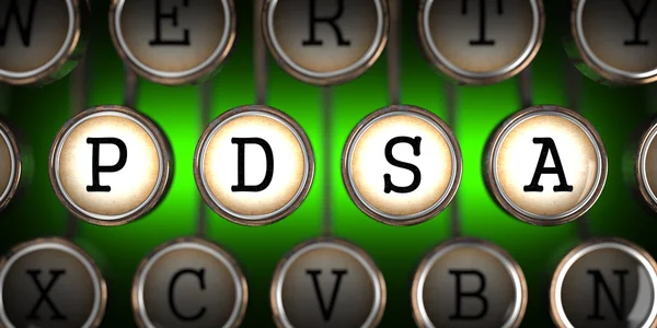 PDSA on Old Typewriter's Keys. — Stock Photo, Image