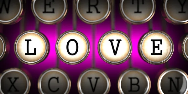Oude schrijfmachine toetsen met liefde slogan. — Stockfoto