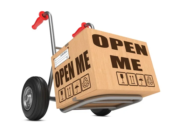 Open Me - Cardboard Box on Hand Truck. — Stock Photo, Image