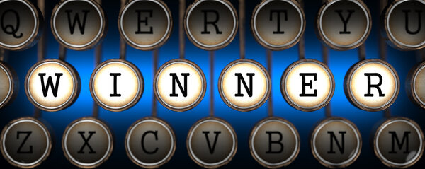Winner on Old Typewriter's Keys.