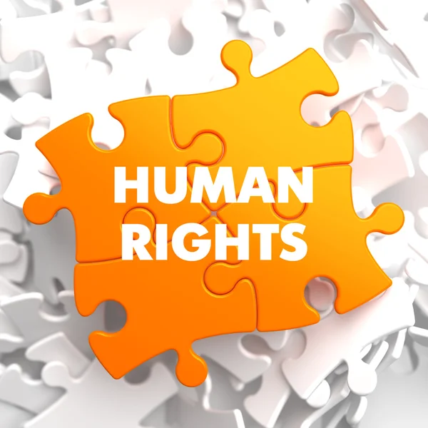 Human Rights on Orange Puzzle. — Stock Photo, Image
