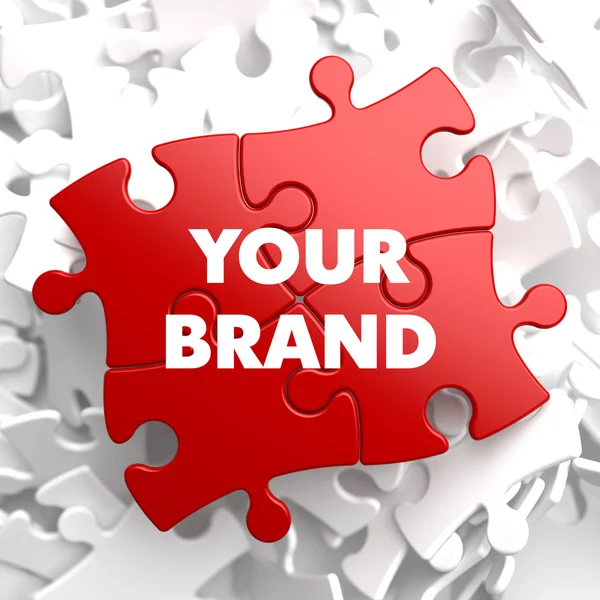 Your Brand Concept on Red Puzzle. — Stock Photo, Image