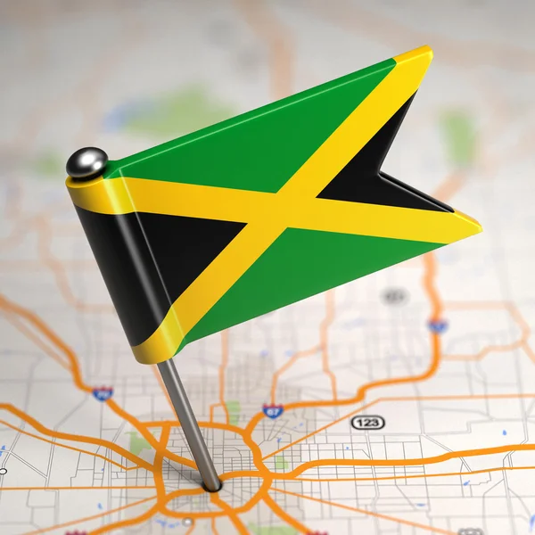 Jamaica Small Flag on a Map Background. — Stock Photo, Image