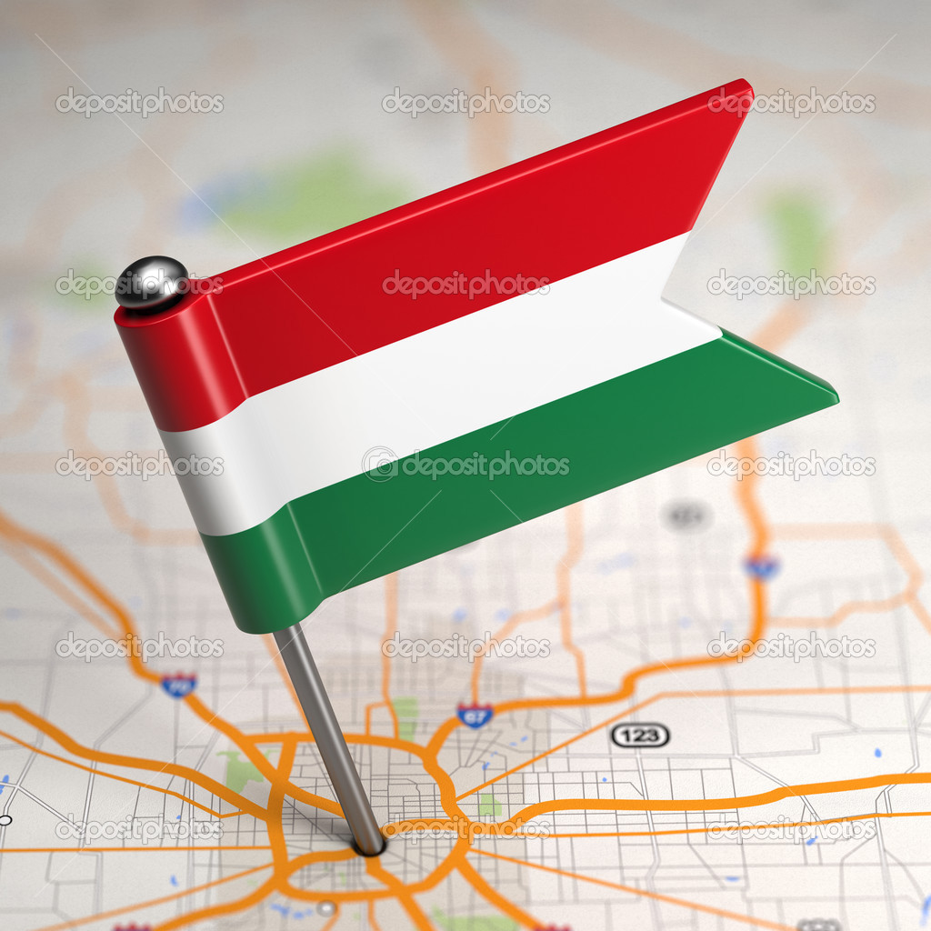 Hungary Small Flag on a Map Background.
