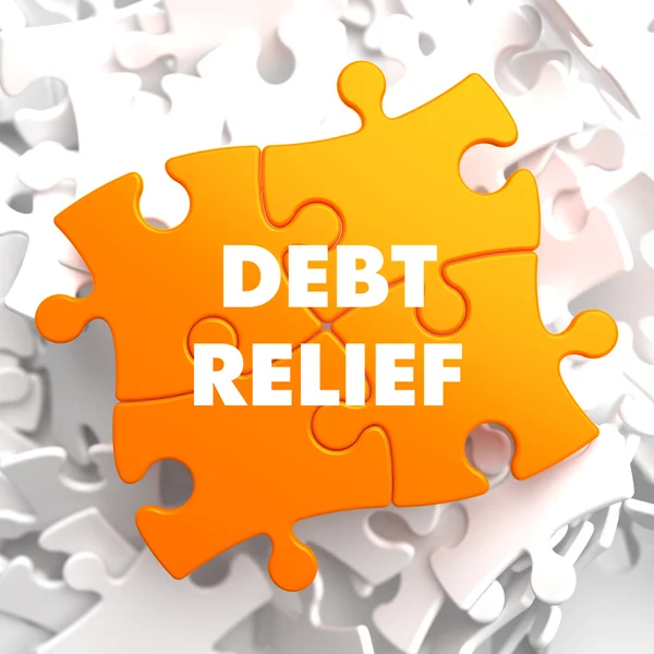 Ελάφρυνση του χρέους σε πορτοκαλί παζλ. — Φωτογραφία Αρχείου