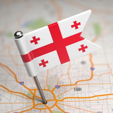 Georgia Small Flag on a Map Background. clipart