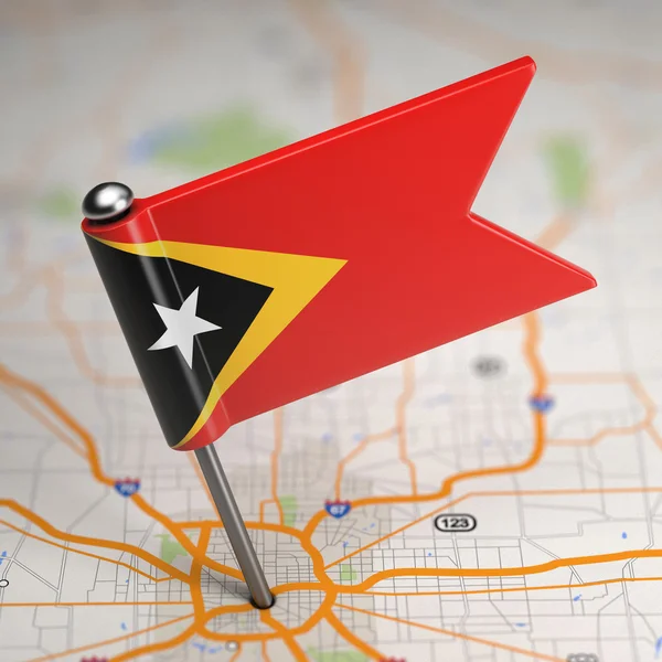 East Timor Small Flag on a Map Background. — Stock Photo, Image