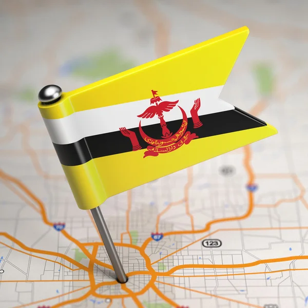 Brunei Small Flag on a Map Background. — Stock Photo, Image