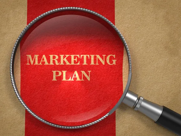 Marketingplan. Lupe auf altem Papier. — Stockfoto