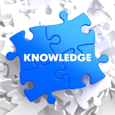 Knowledge Concept on Blue Puzzle. clipart
