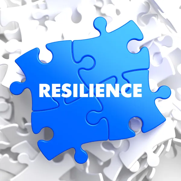 Resiliencia - Palabra sobre el rompecabezas azul . — Foto de Stock