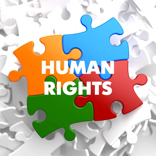 Human Rights on Multicolor Puzzle. — Stock Photo, Image