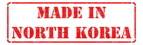 Made in North Korea - Inschrift auf rotem Gummistempel. — Stockfoto