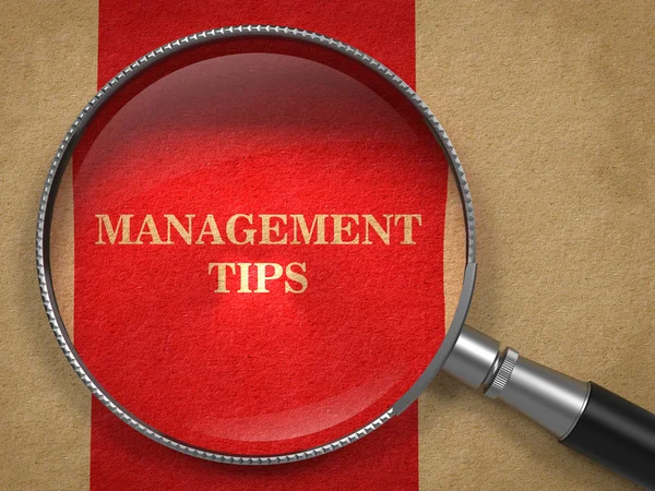 Management-Tipps Lupe auf altem Papier. — Stockfoto
