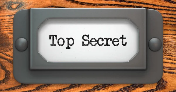 Top secret - concept op label houder. — Stockfoto