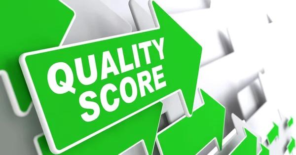 Quality Score on Green Direction Arrow Sign. — Stock Photo, Image