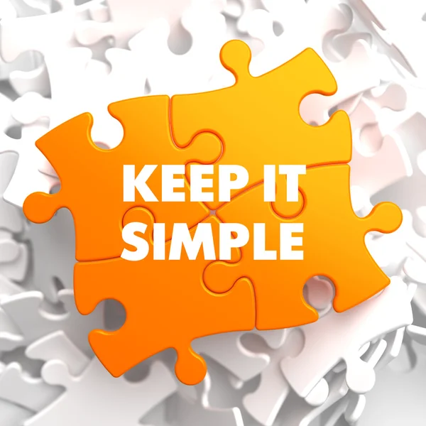 Keep it Simple on Yellow Puzzle. — Stock Photo, Image
