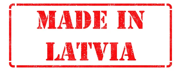 Hecho en Letonia con sello de goma roja . —  Fotos de Stock