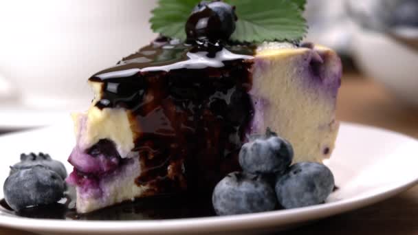 Slice Blueberries Yoghurt Cake White Ceramic Dish Taking Bite Blueberries — ストック動画