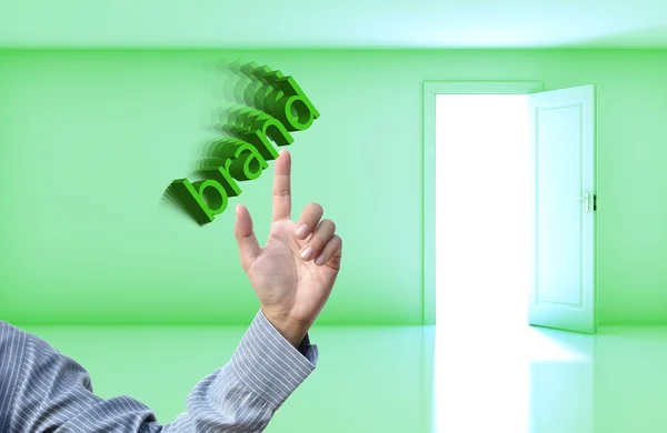 Podnikatelský koncept s obchodní ruku na pozadí zelených prázdné místnosti otevřené dveře. — Stock fotografie